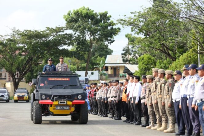 
 Bupati Tanah Bumbu Andi Rudi Latif Pimpin Apel Gelar Pasukan Operasi Ketupat Intan 2026