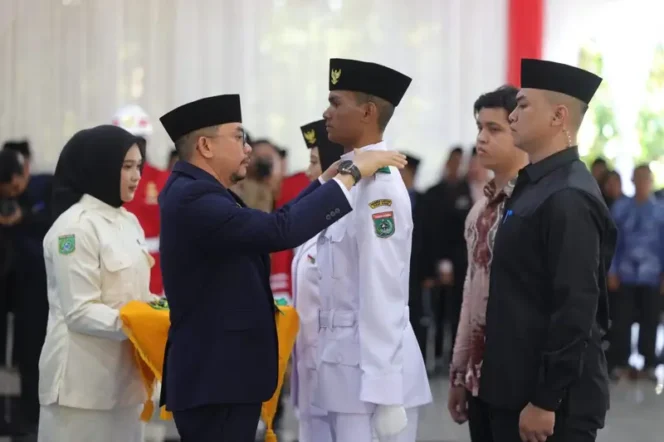 
 Bupati Andi Rudi Latif Kukuhkan Paskibraka Angkatan 23 Tanah Bumbu Tahun 2026